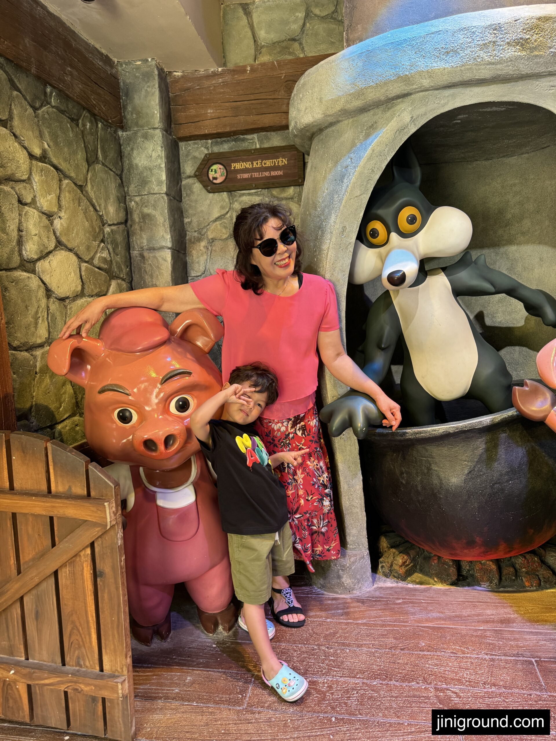 Children playing with large animal costume characters at VinWonders Phu Quoc