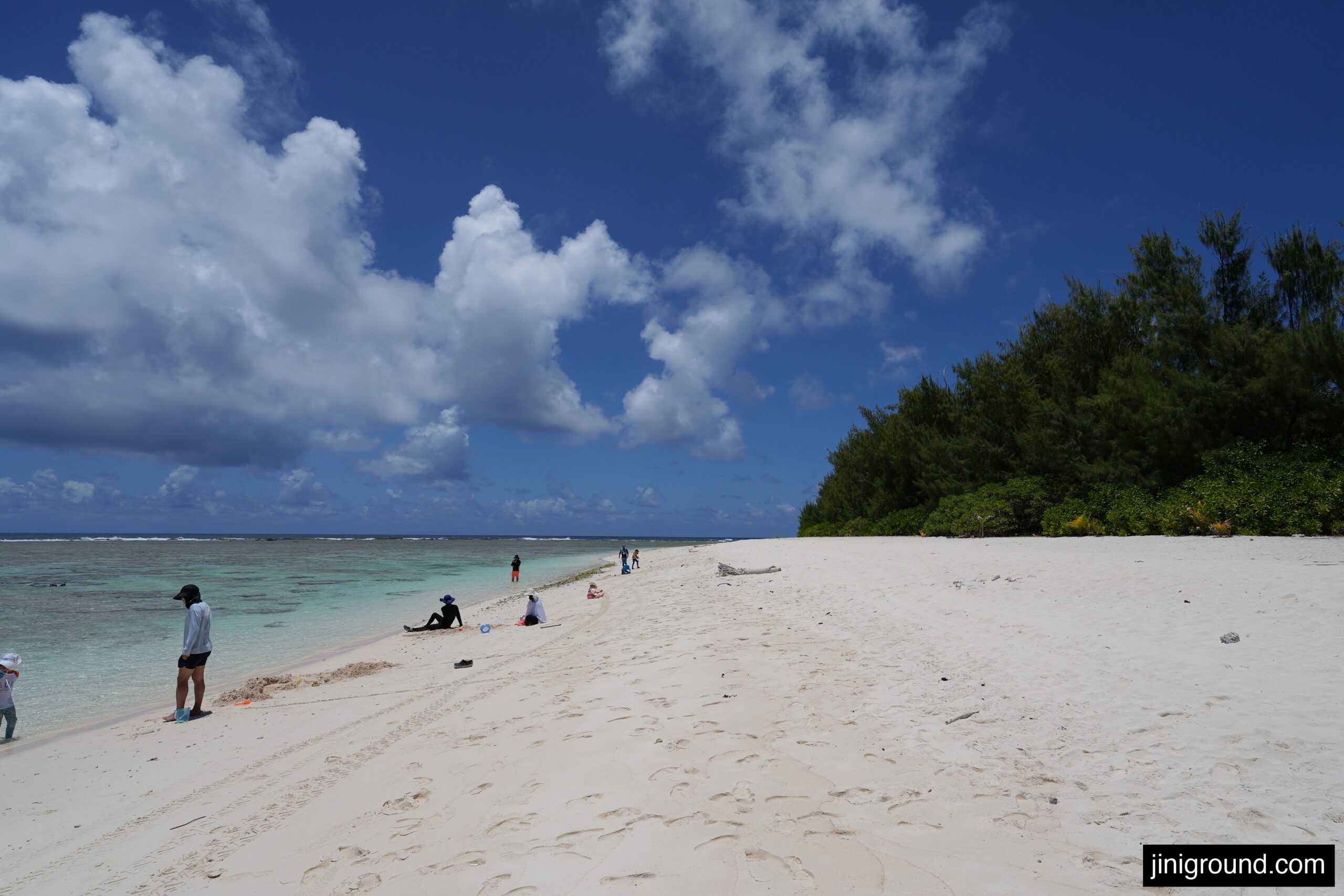 white sand beach and blue sky at Ritidian Point Guam with families
