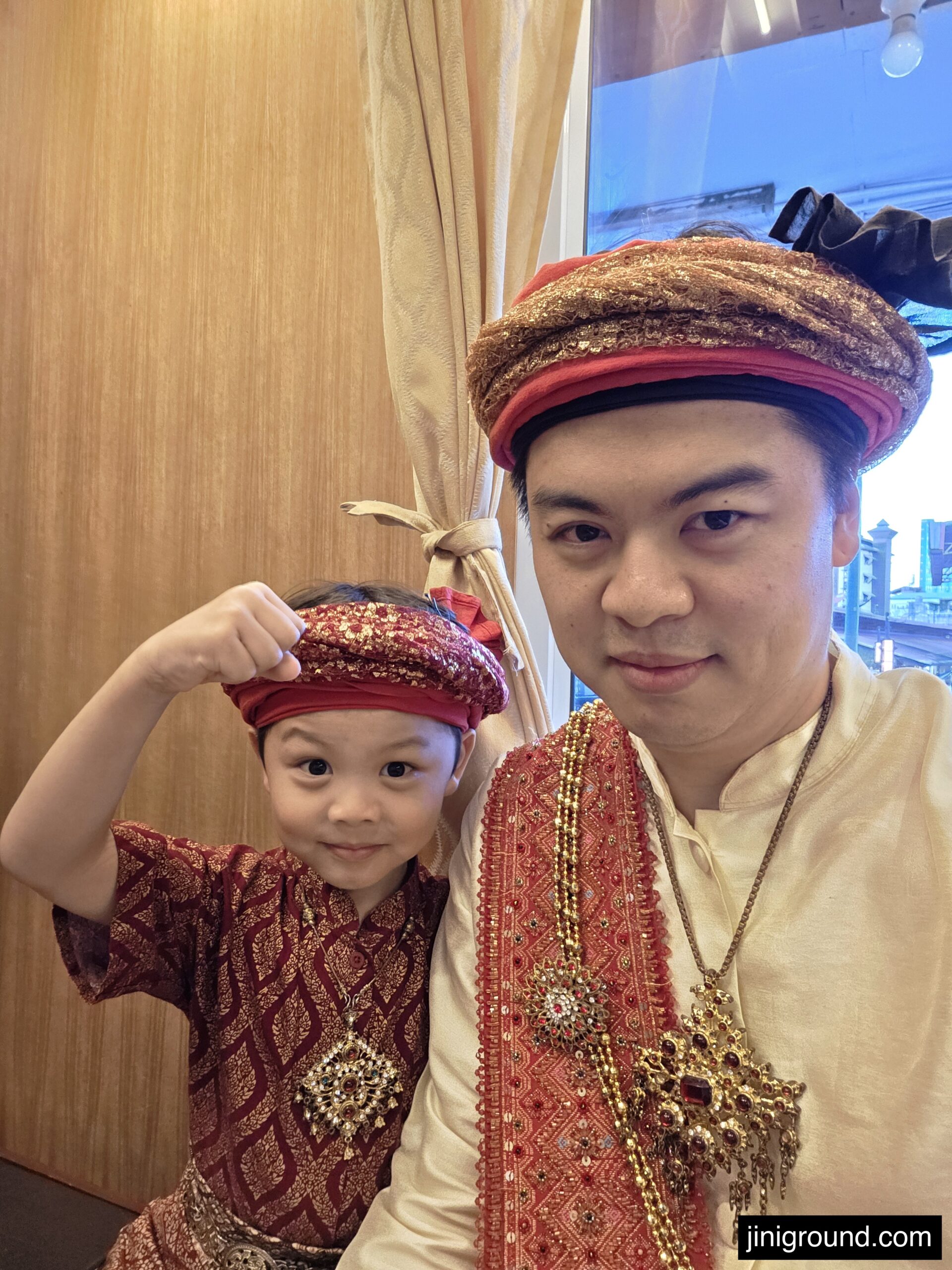 dad and son wearing matching Thai traditional costumes at Nakara Chiangmai Studio