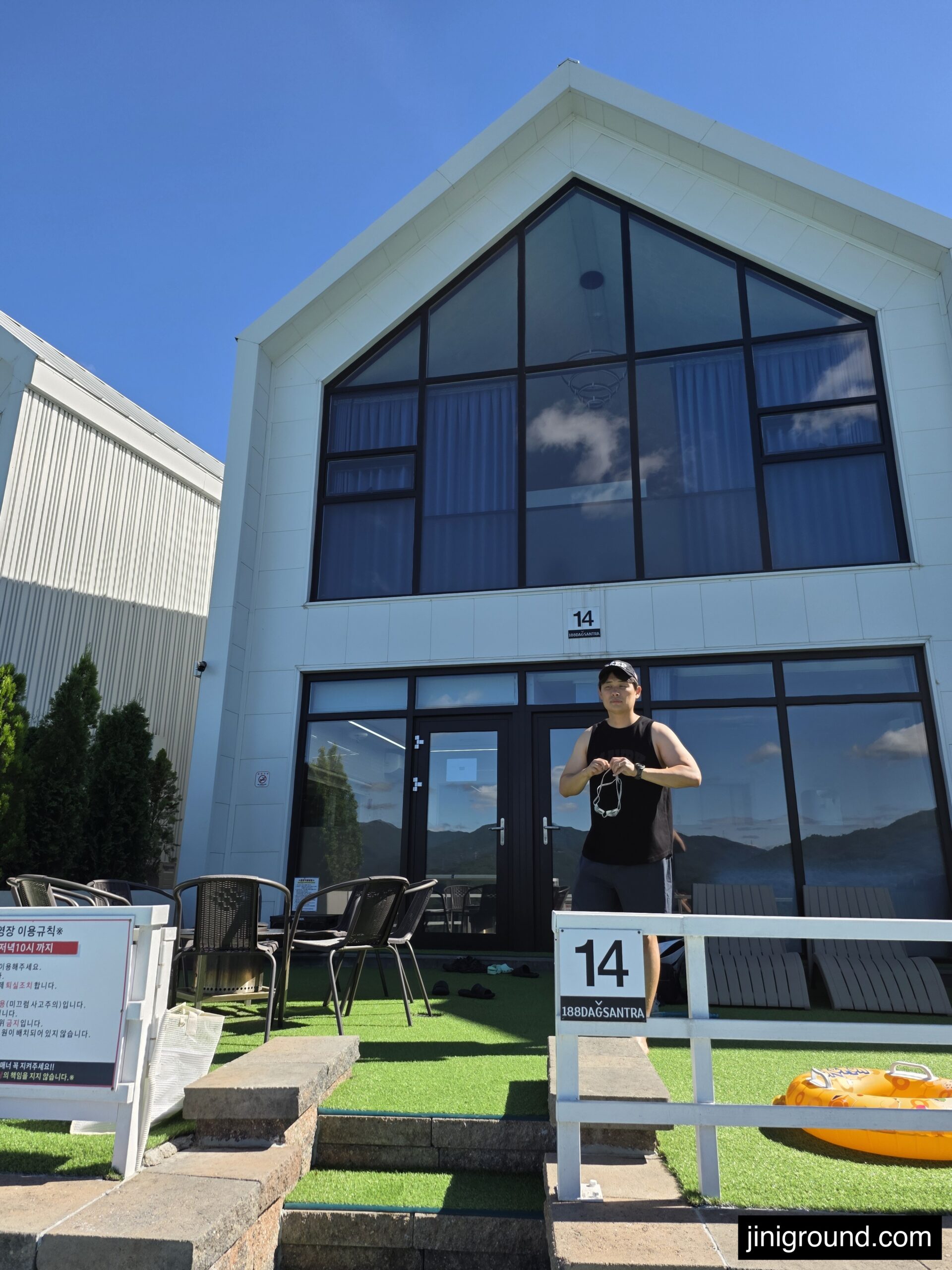 Gapyeong 188 Dagsantra pool villa unit 14 exterior with pool rules sign and inflatable tube